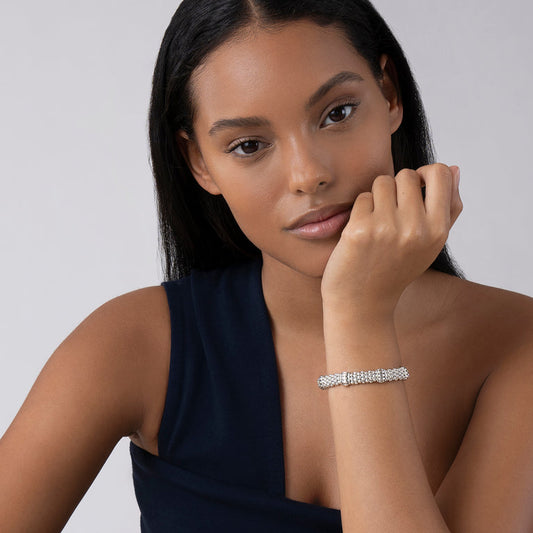 Sterling silver beaded bracelet on wrist.