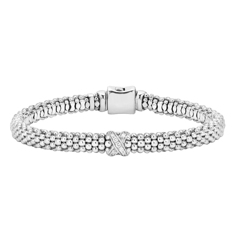 Sterling silver bracelet with diamond accents.