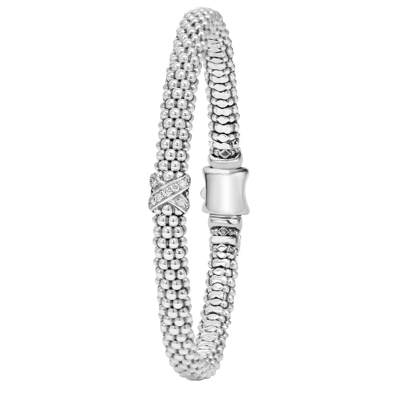 Sterling silver bracelet with diamond accents.