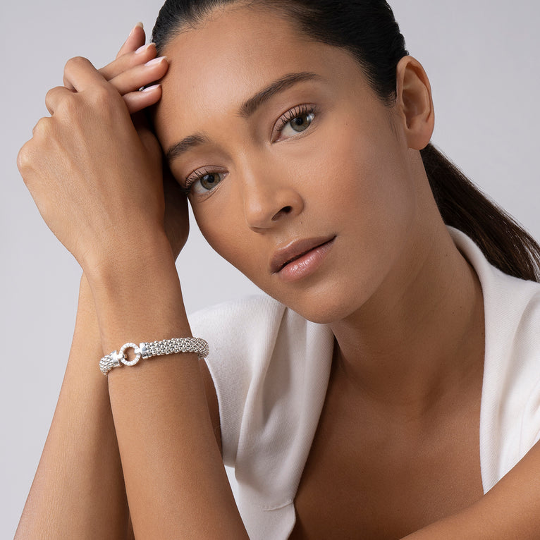 Sterling silver bracelet with round diamonds.