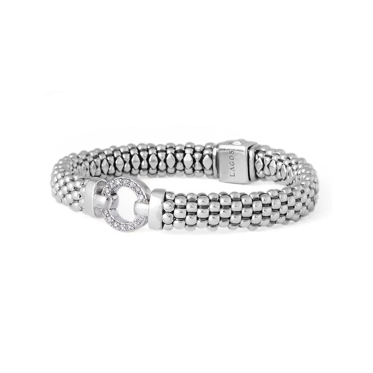 Sterling silver bracelet with round diamond clasp.