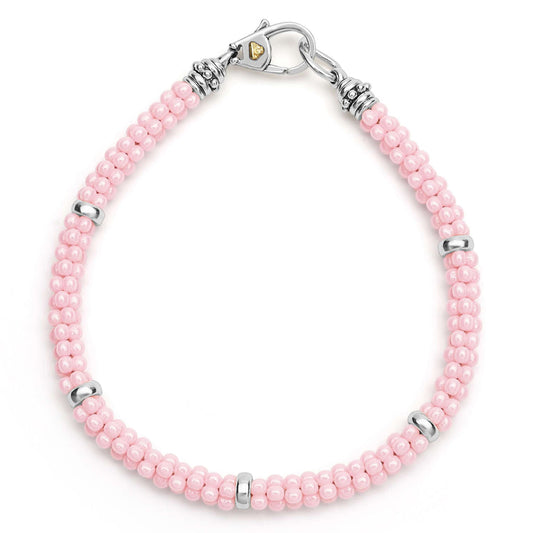 Pink ceramic and silver station bracelet.