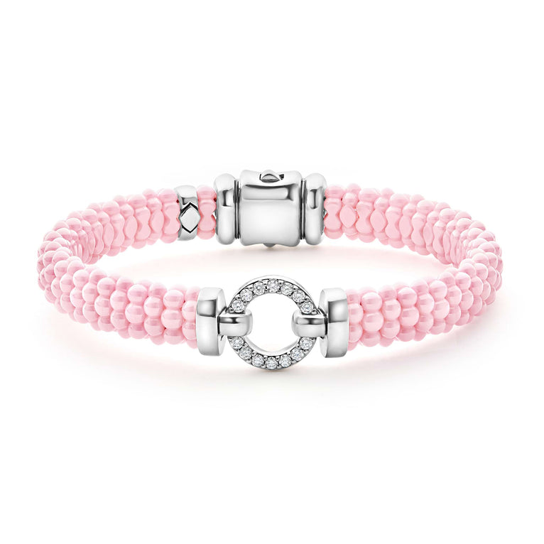 Pink beaded bracelet with diamond circle clasp.