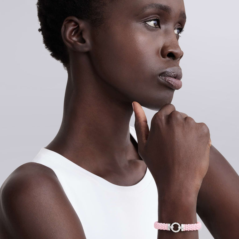 Pink caviar bracelet with diamond accents.