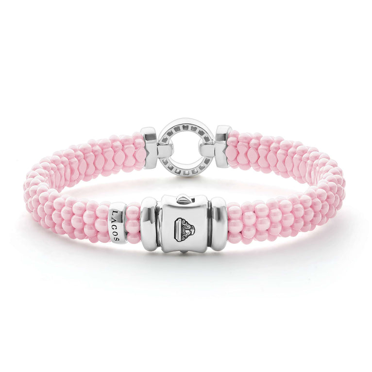 Pink beaded bracelet with silver accents.