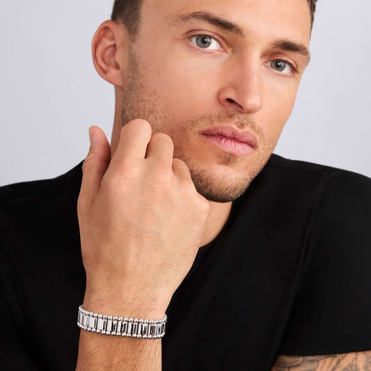 Sterling silver bracelet with intricate detailing.