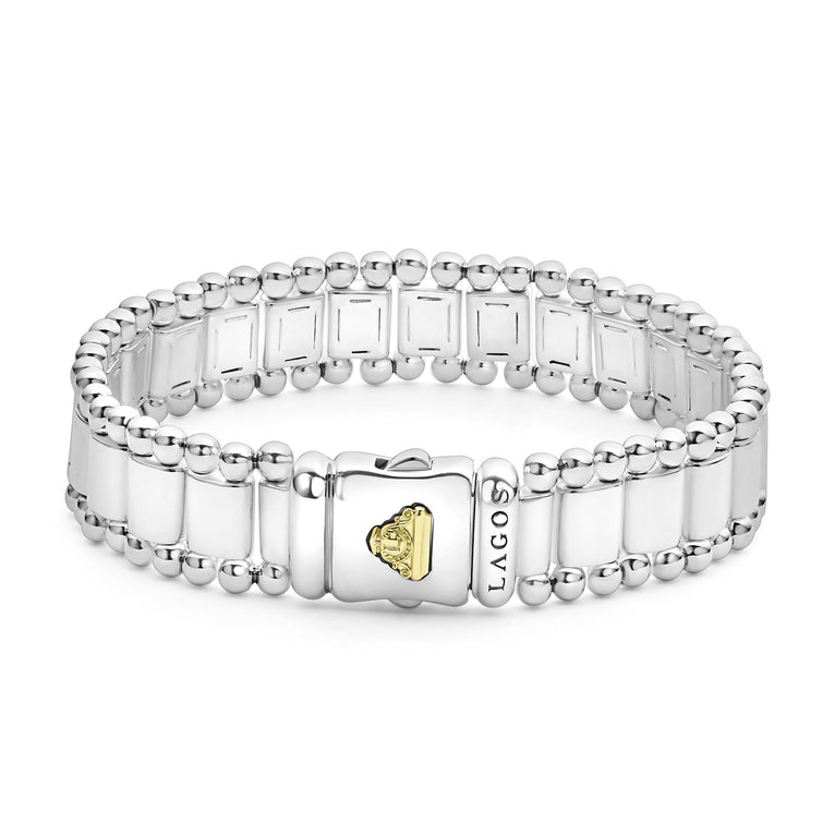 Sterling silver bracelet with gold accent.