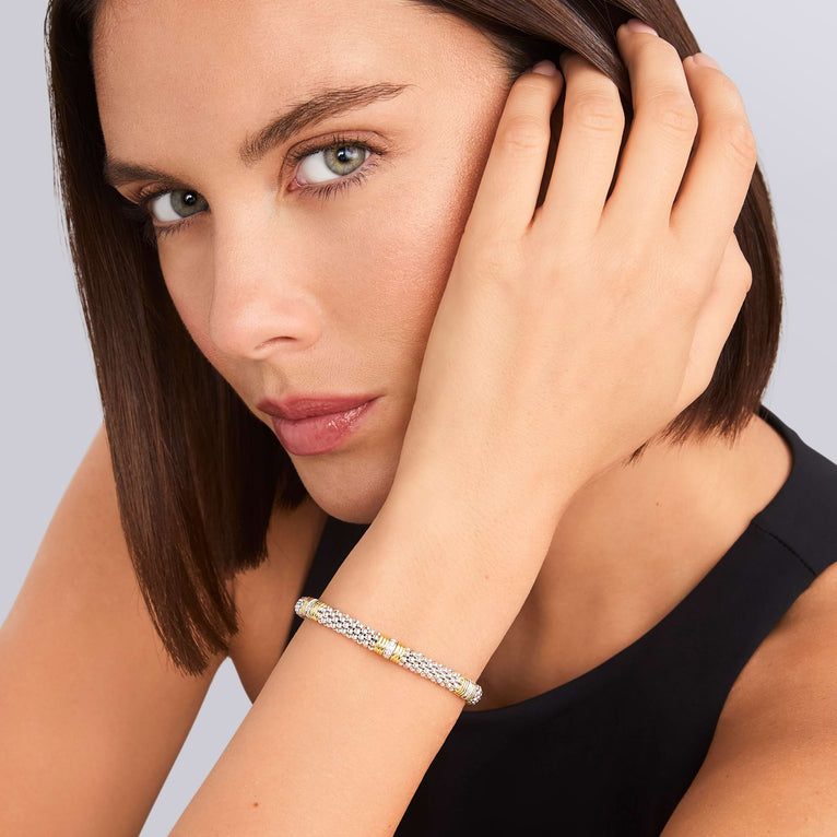 Sterling silver bracelet with diamond accents.