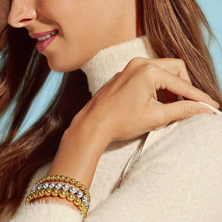 Sterling silver bead bracelet, elegant design.