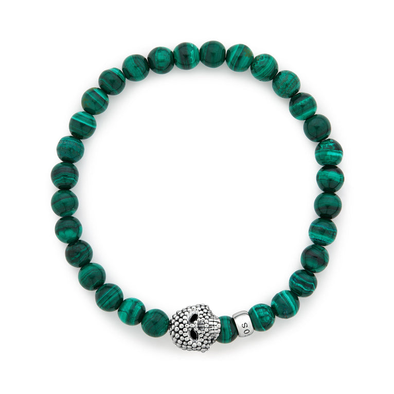 Green malachite bracelet with silver accents.