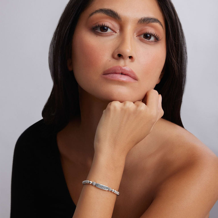 Sterling silver beaded stretch bracelet.