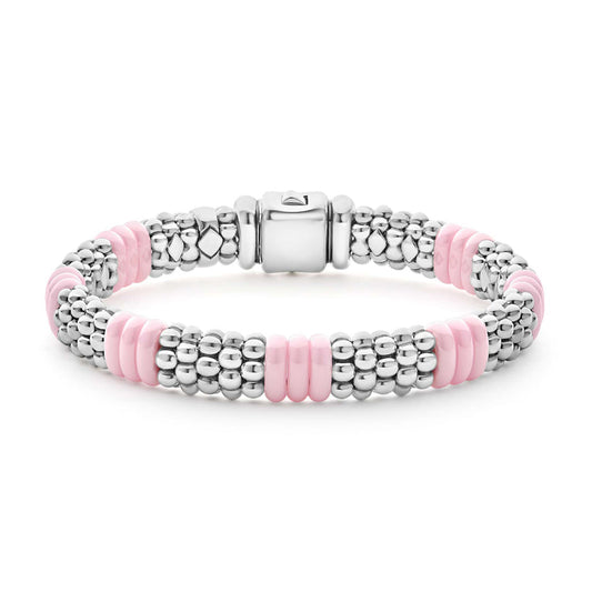 Sterling silver bracelet with pink ceramic accents.