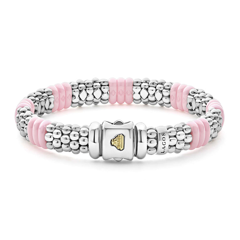 Sterling silver bracelet with pink ceramic accents.