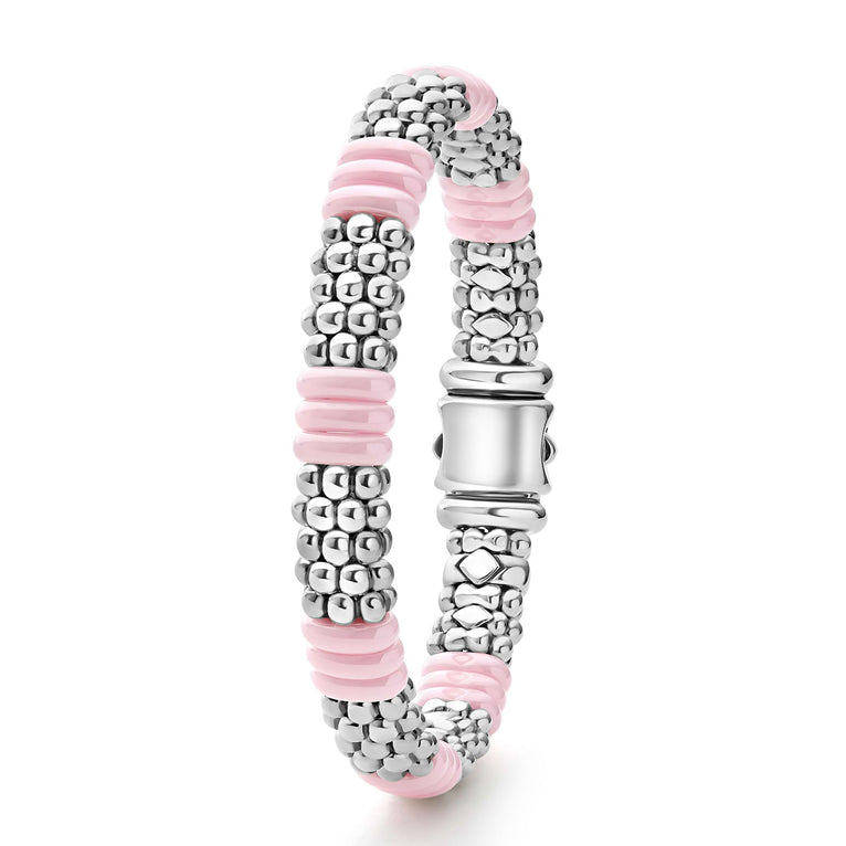 Sterling silver bracelet with pink ceramic accents.