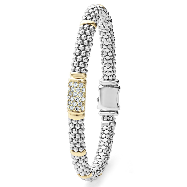 Sterling silver bracelet with diamond accents.