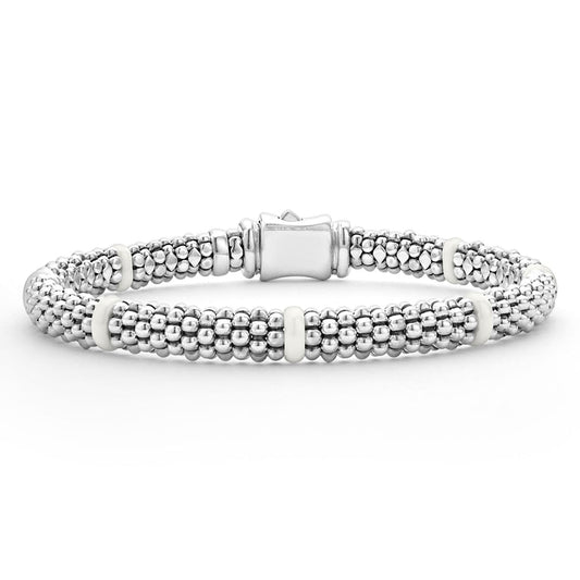 Sterling silver beaded bracelet with white accents.