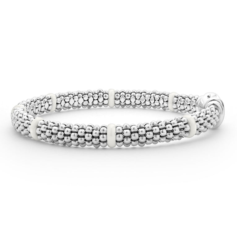 Sterling silver beaded bracelet with white accents.