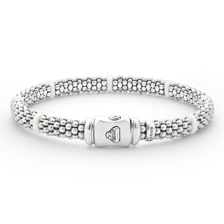 Sterling silver beaded bracelet with white accents.