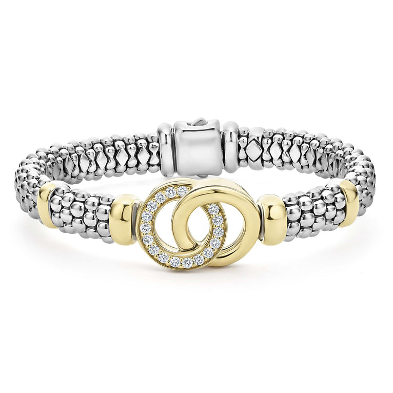 Sterling silver bracelet with diamond gold accents.