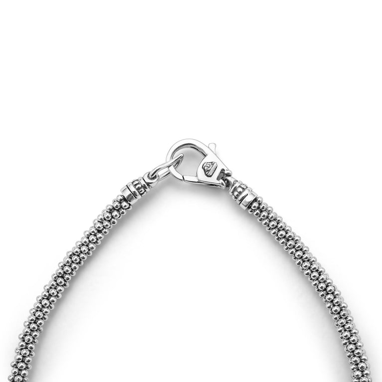 Sterling silver bracelet with textured design.