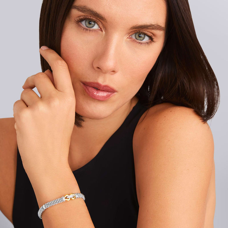 Sterling silver bracelet with diamond accents.