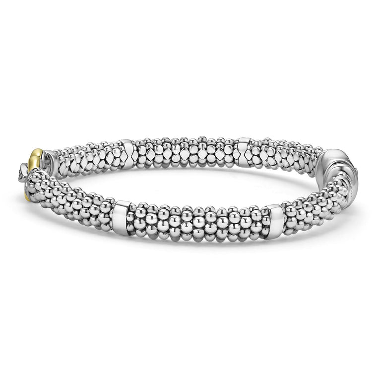 Sterling silver bracelet with diamond accents.