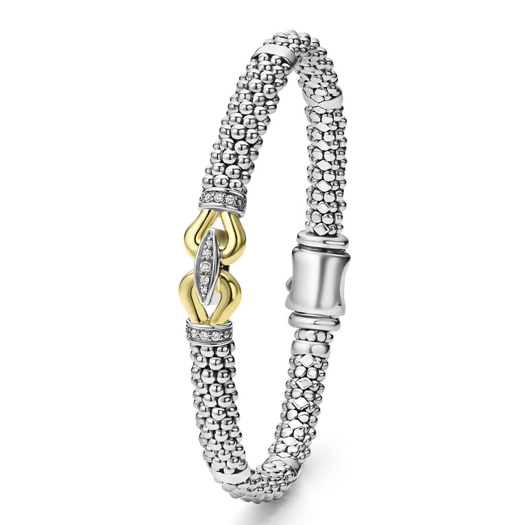 Sterling silver bracelet with diamond accents.