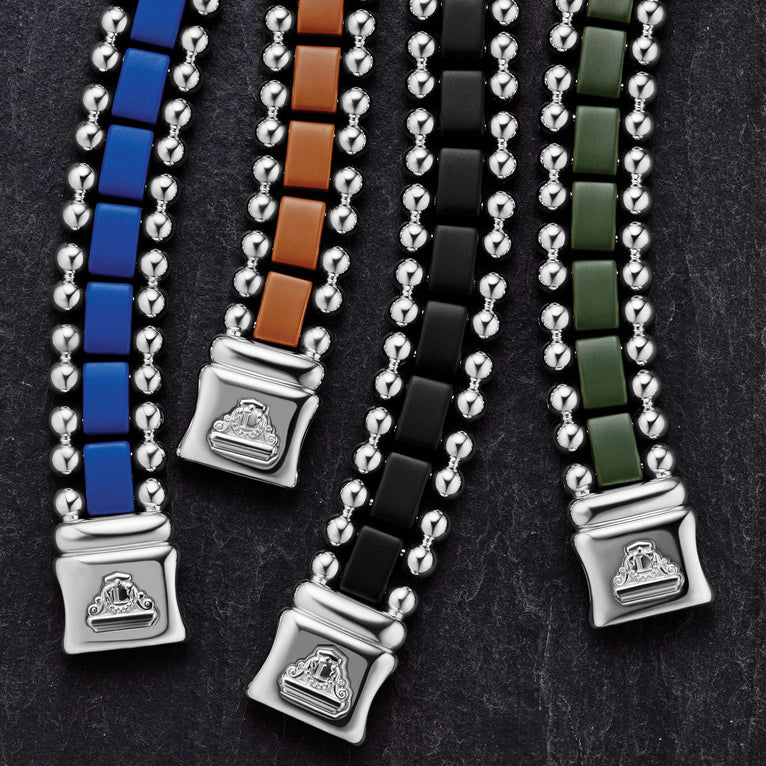 Green ceramic bracelet with silver links.