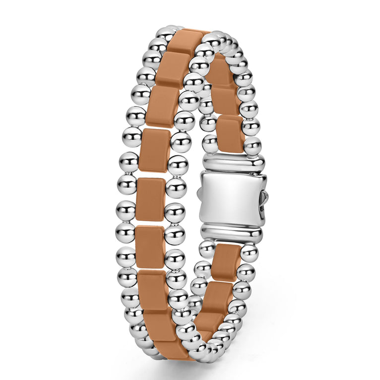 Brown ceramic bracelet with silver links.
