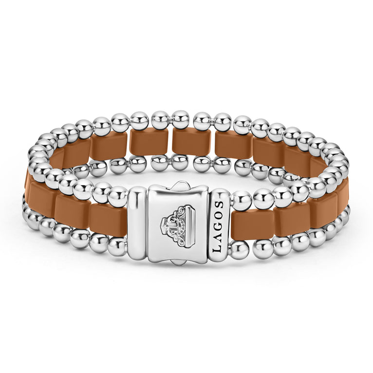 Brown ceramic bracelet with silver bead accents.