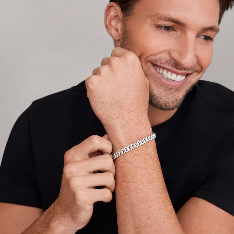 Sterling silver curb link bracelet worn.