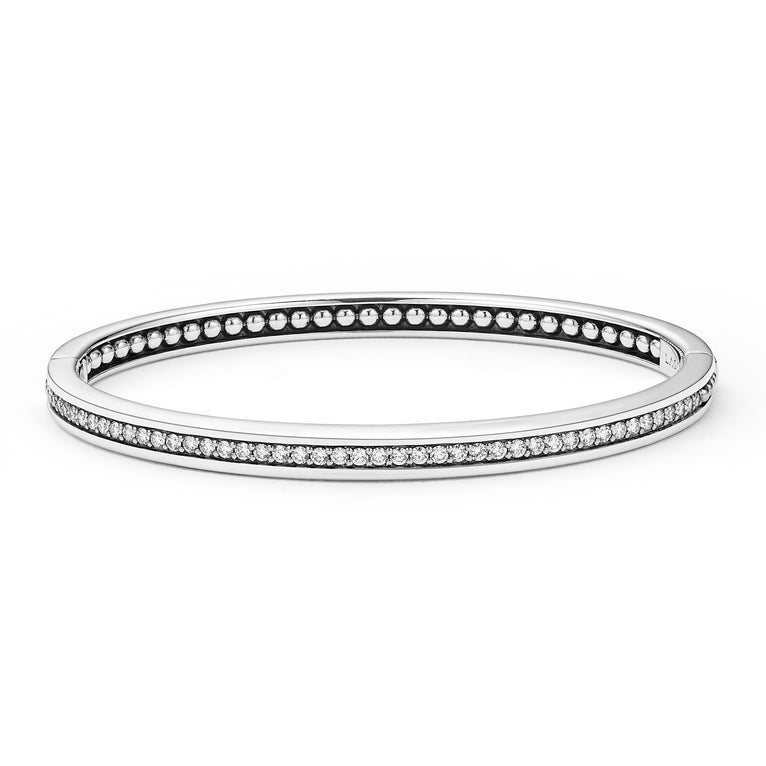 Sterling silver bracelet with round diamonds.