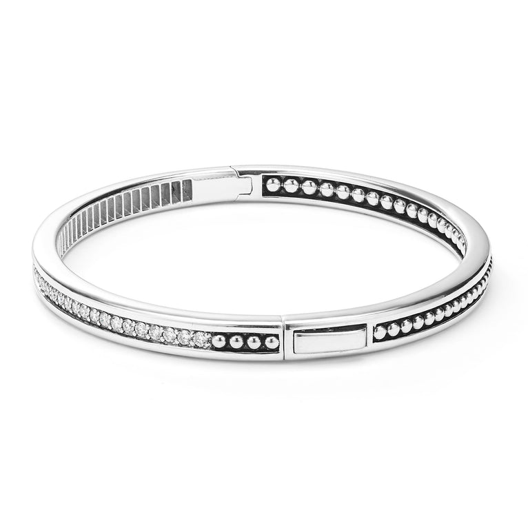 Sterling silver bracelet with round diamonds.