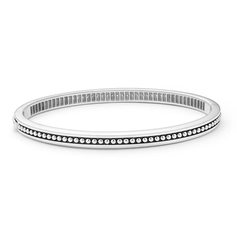 Sterling silver bracelet with round diamonds.