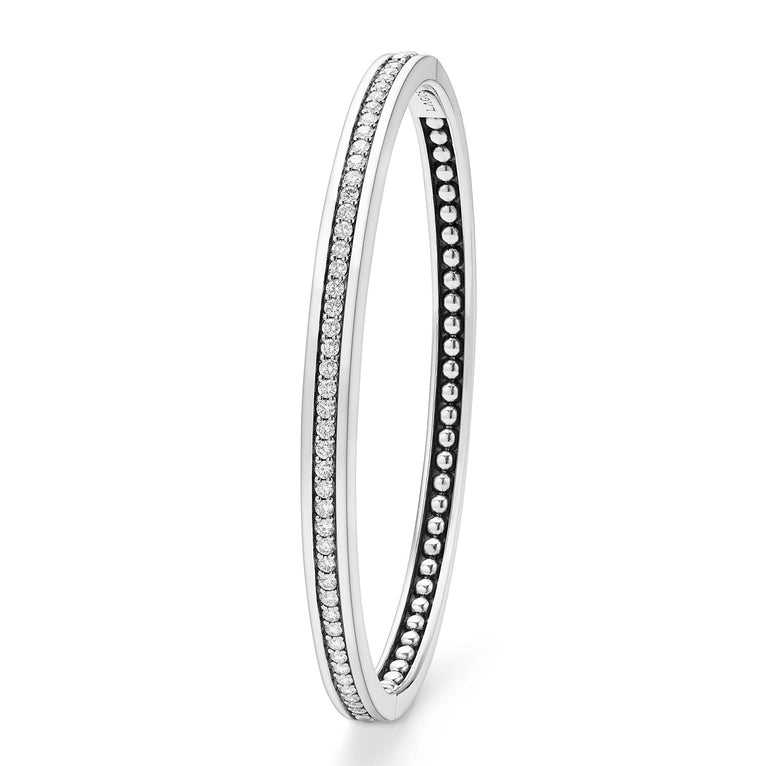 Sterling silver bracelet with round diamonds.