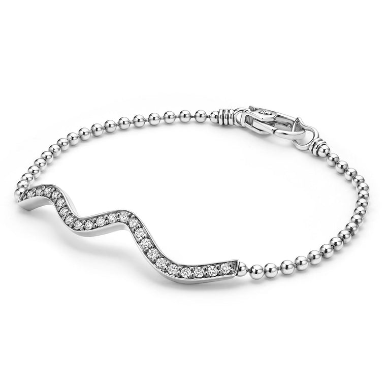 Sterling silver bracelet with diamond wave design.