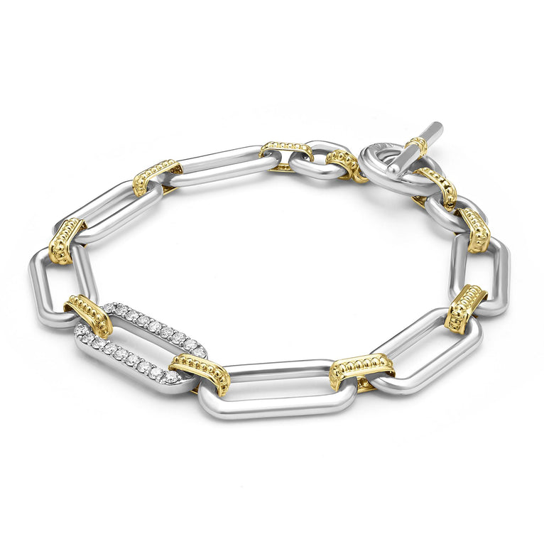 Sterling silver bracelet with diamonds and gold accents.