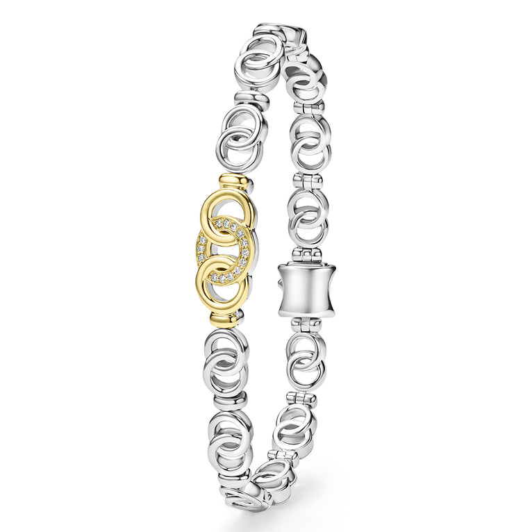 Sterling silver bracelet with diamond accents.