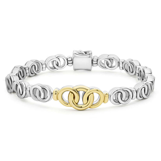 Sterling silver and gold fancy link bracelet.