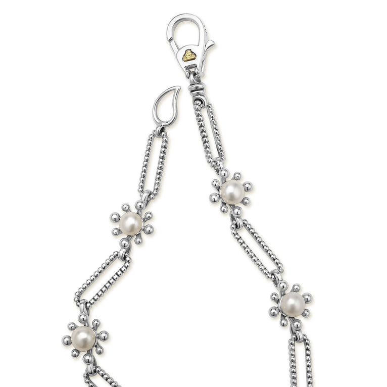 Sterling silver bracelet with freshwater pearls.