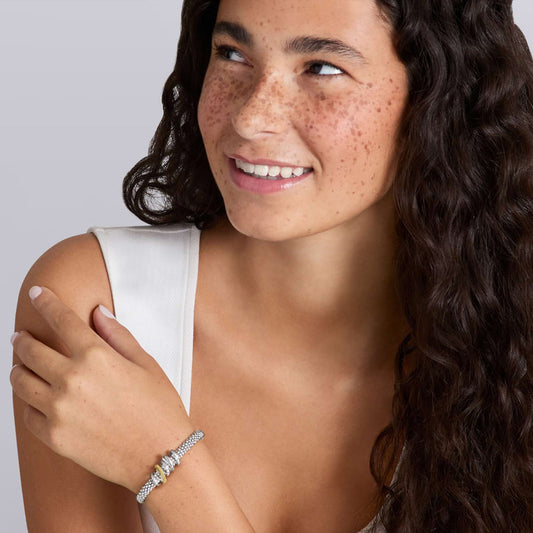 Sterling silver bracelet with round diamonds.