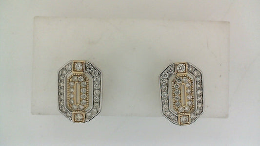Two-tone diamond stud earrings with geometric design.