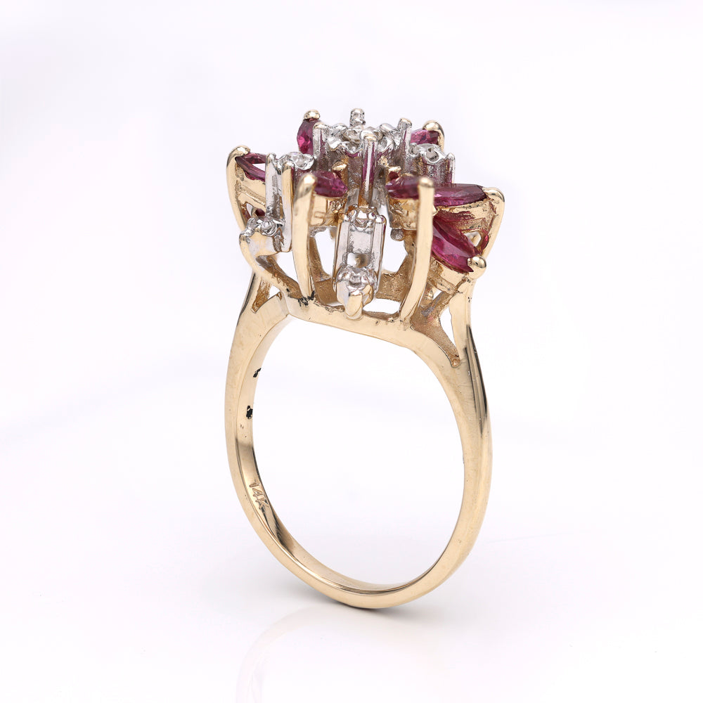 14K gold ring with marquise rubies.