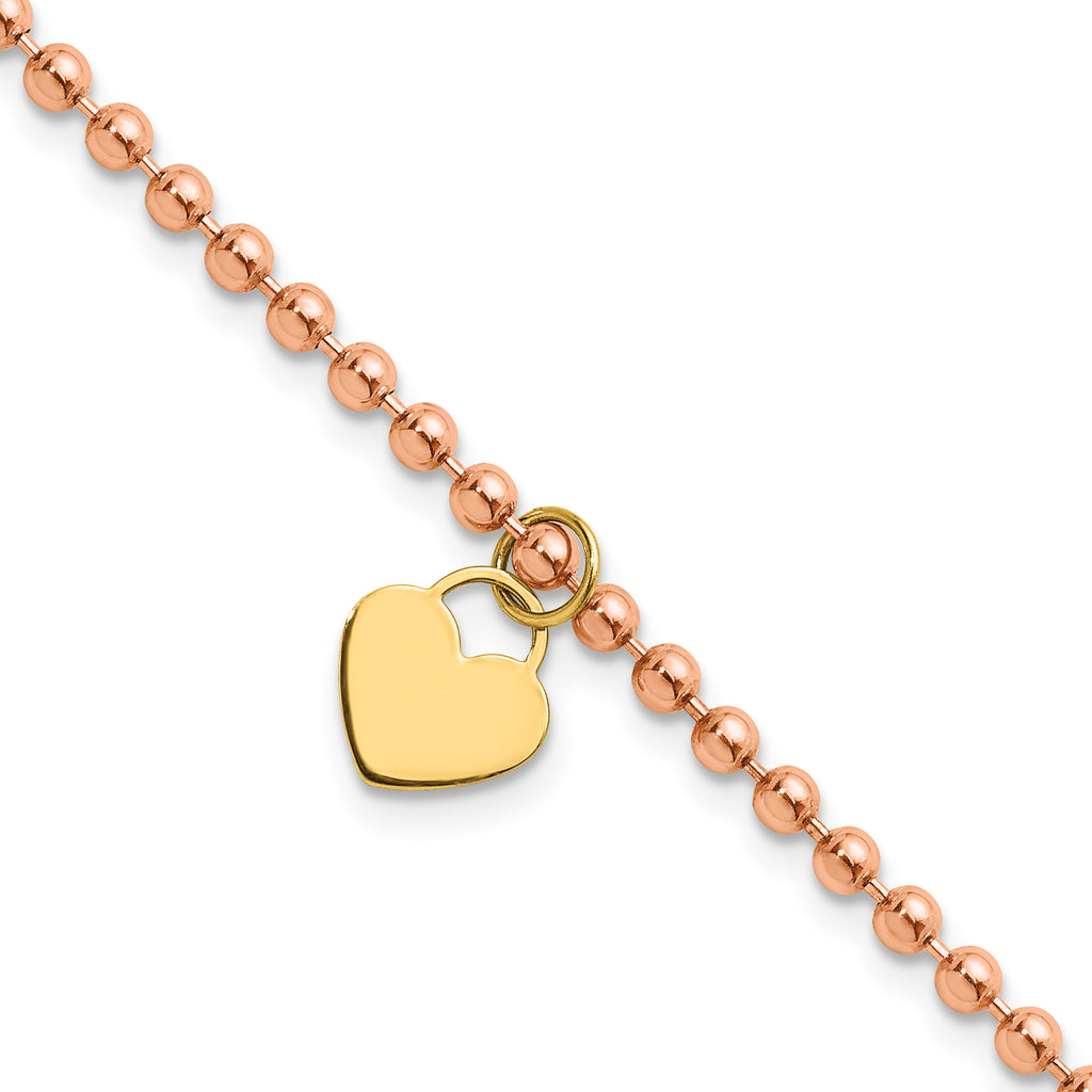 Heart charm bracelet, yellow and rose gold.