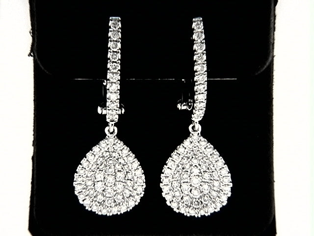 Dangle diamond earrings in white gold.