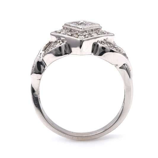 10K white gold ring with diamonds.