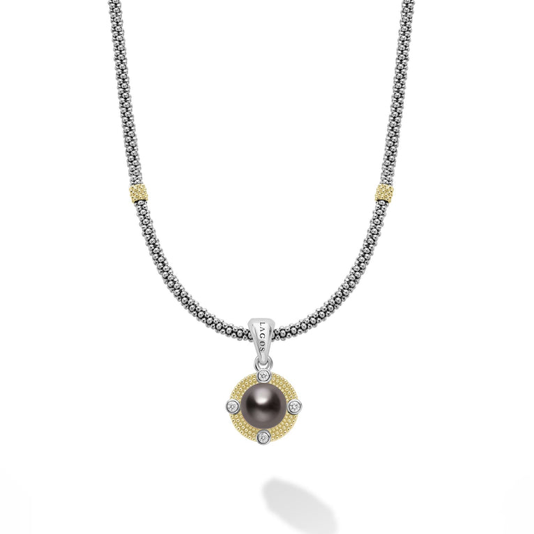 Sterling silver necklace with black pearl pendant.
