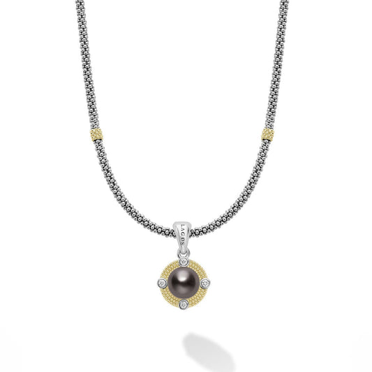Sterling silver necklace with black pearl pendant.