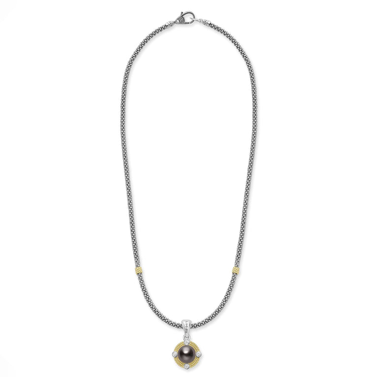 Sterling silver necklace with black pearl pendant.
