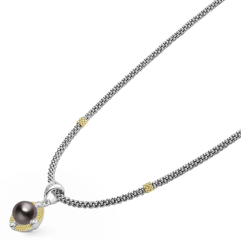 Sterling silver necklace with black pearl pendant.